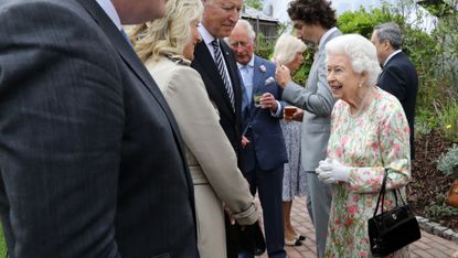 the queen brooch g7