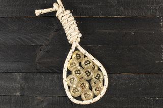 A bunch of bitcoin in a noose.