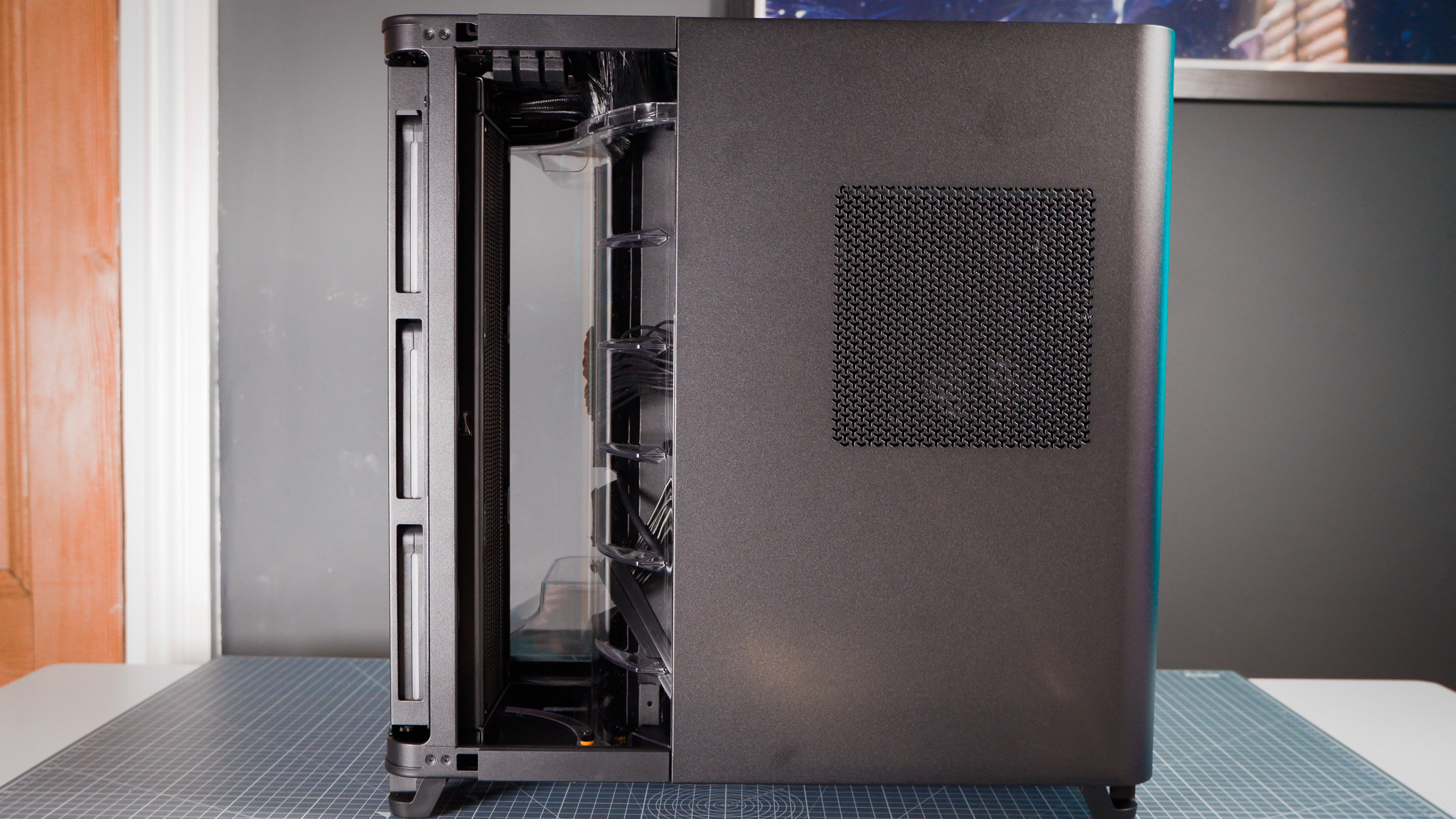 A Corsair Air 5400 PC case on a desk with various parts installed.