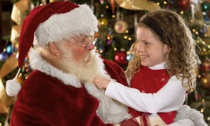 Don't push the truth about Santa on your kids, suggests one commentator, until they show signs they're ready.