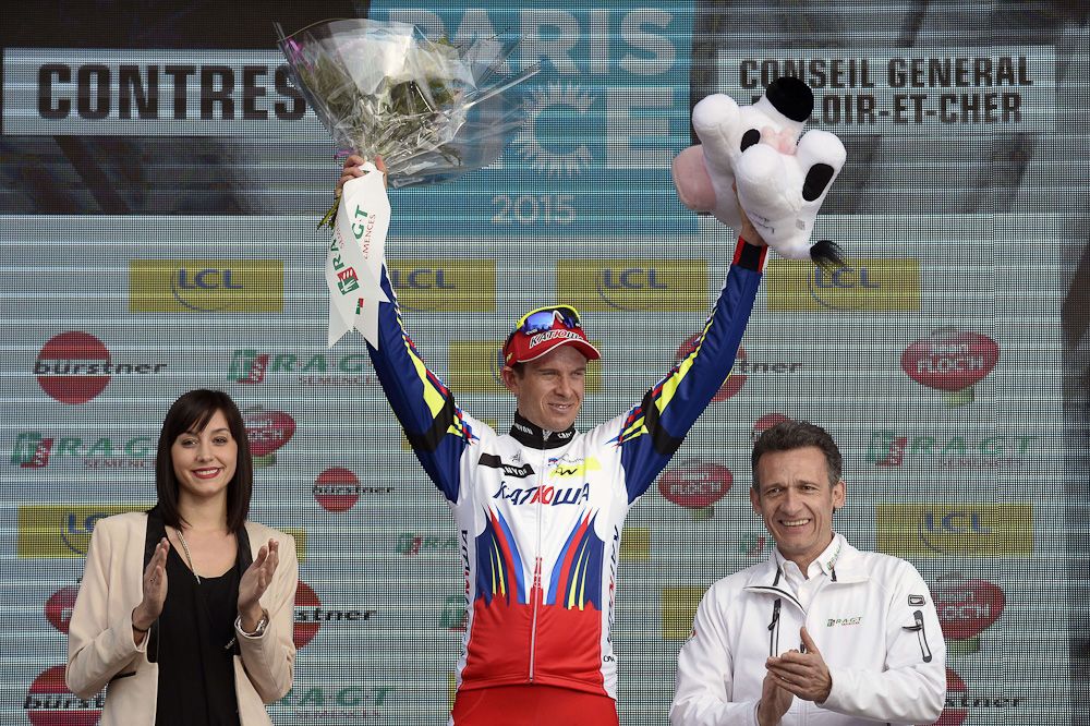 Alexander Kristoff celebrates on the podium after winning the first stage of Paris-Nice.