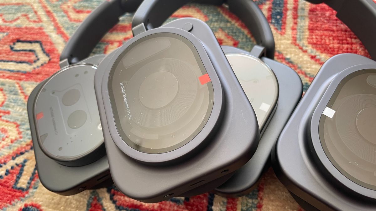 Nothing Headphone (1) Pro beside Headphone (a)