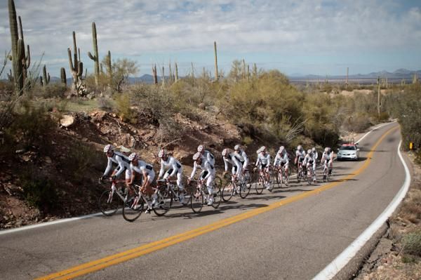 The team rolls through the Tucson foothills.