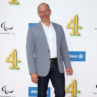 phil spencer poses during the channel 4 red carpet paralympic launch at channel 4 studios london