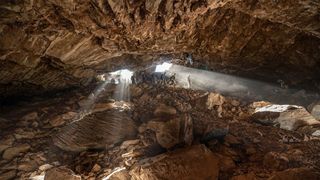 Archaeologists explore the vast Chiquihuite Cave in the Chiapas Highlands of northwest Mexico.