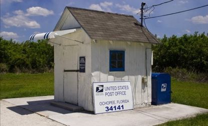 Will the country's smallest Post Office survive the U.S. Postal Service's major budget cuts? The indebted government agency said it will close 2,000 locations. 