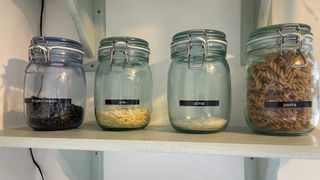 Brother BT H110 label maker labels made on jars in a kitchen