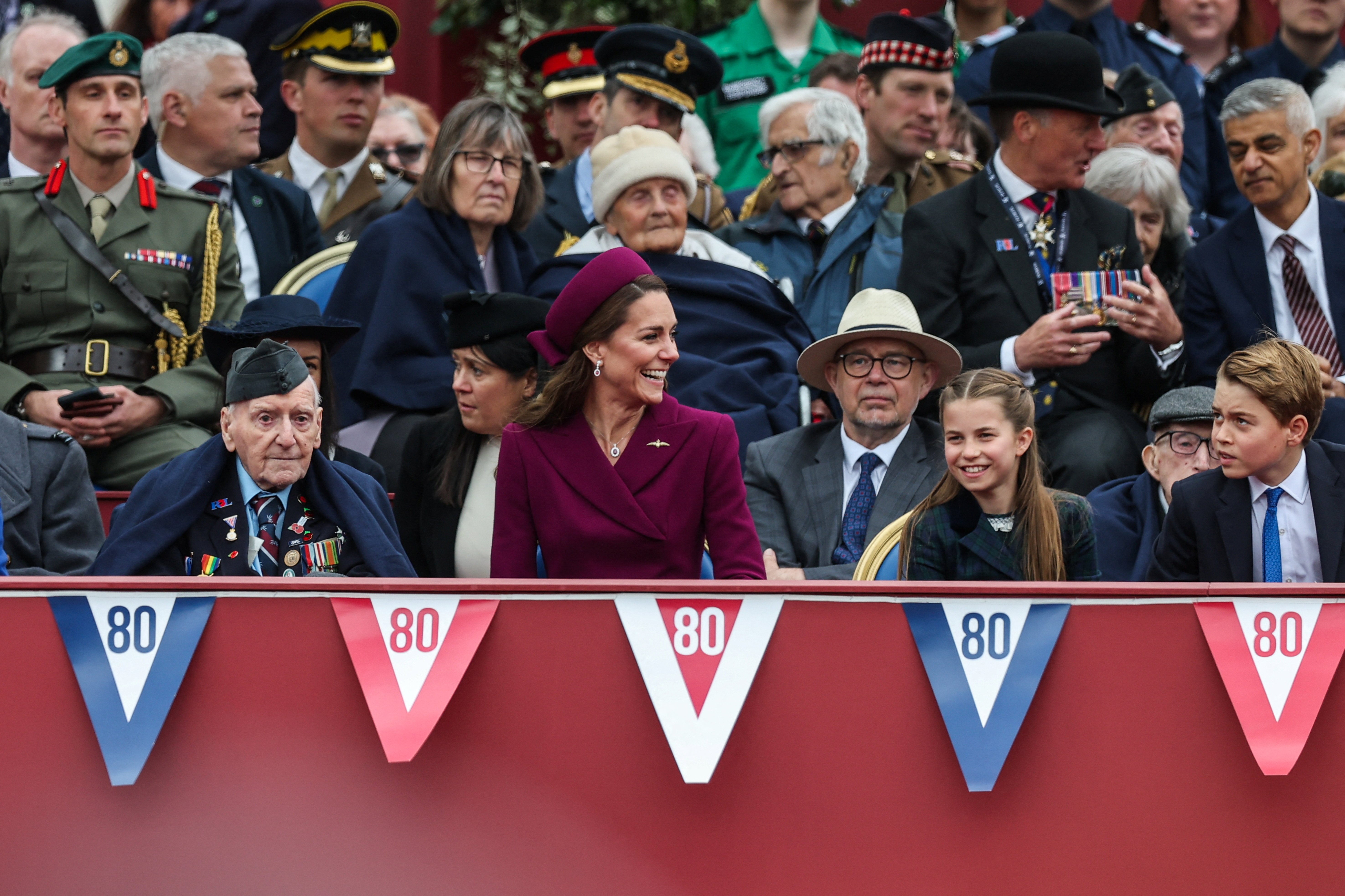 Princess Kate, Princess Charlotte and Prince George sitting at VE Day event