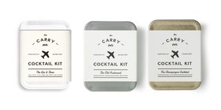 Three small cocktail kit tins.
