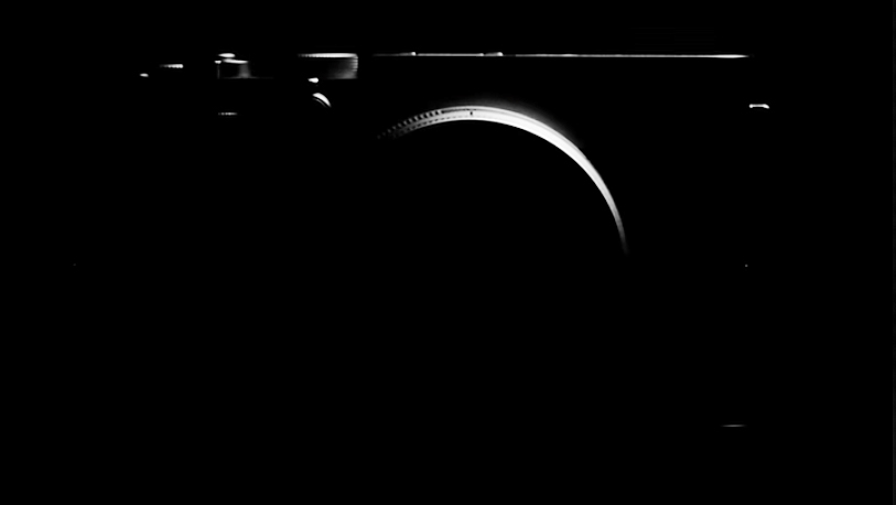 Fujiflm teaser showing silhouette of a new rangefinder-style camera to be revealed at X-Summit Shanghai