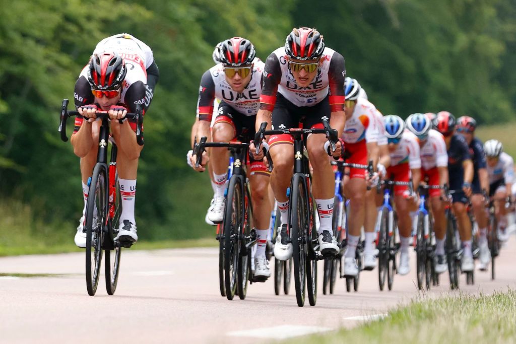 Team UAE Emirates teammates lead the second pack during the 7th stage of the 108th edition of the Tour de France cycling race 249 km between Vierzon and Le Creusot on July 02 2021 Photo by Thomas SAMSON AFP Photo by THOMAS SAMSONAFP via Getty Images