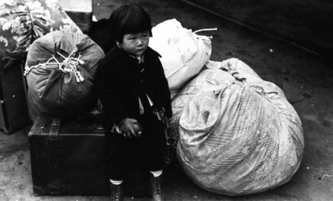 A boy waits in Los Angeles in 1942