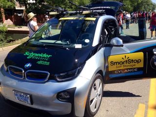 In a first for the pro peloton, Team SmartStop assistant director Gord Fraser drove an all-electric BMW in the caravan during two stages of the USA Pro Challenge last week in Colorado.