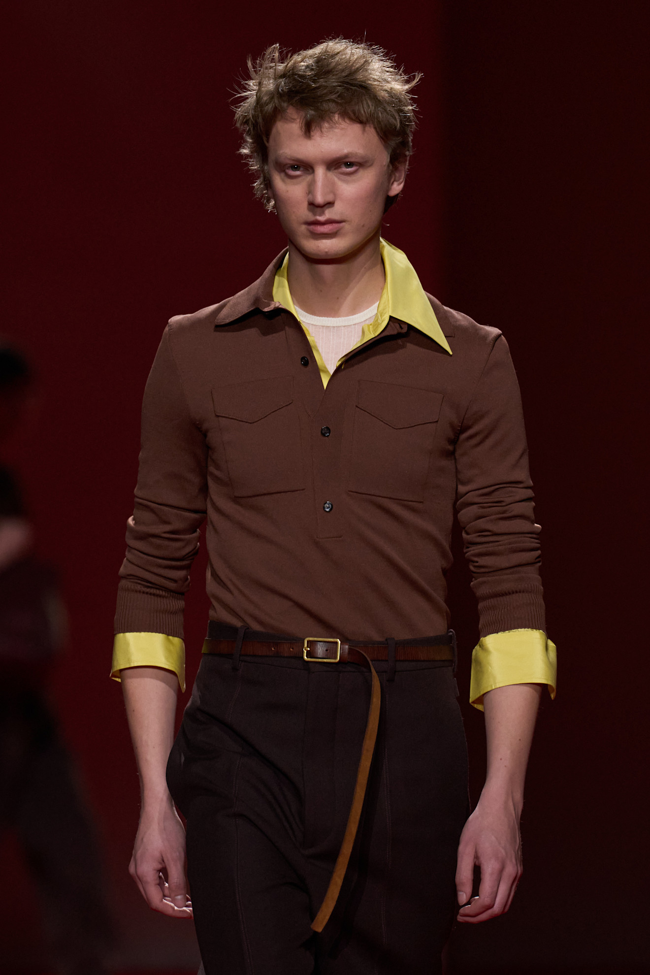 Model wears colourful cuffs on the A/W 26 runway