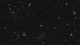 stars and galaxies set against a black background