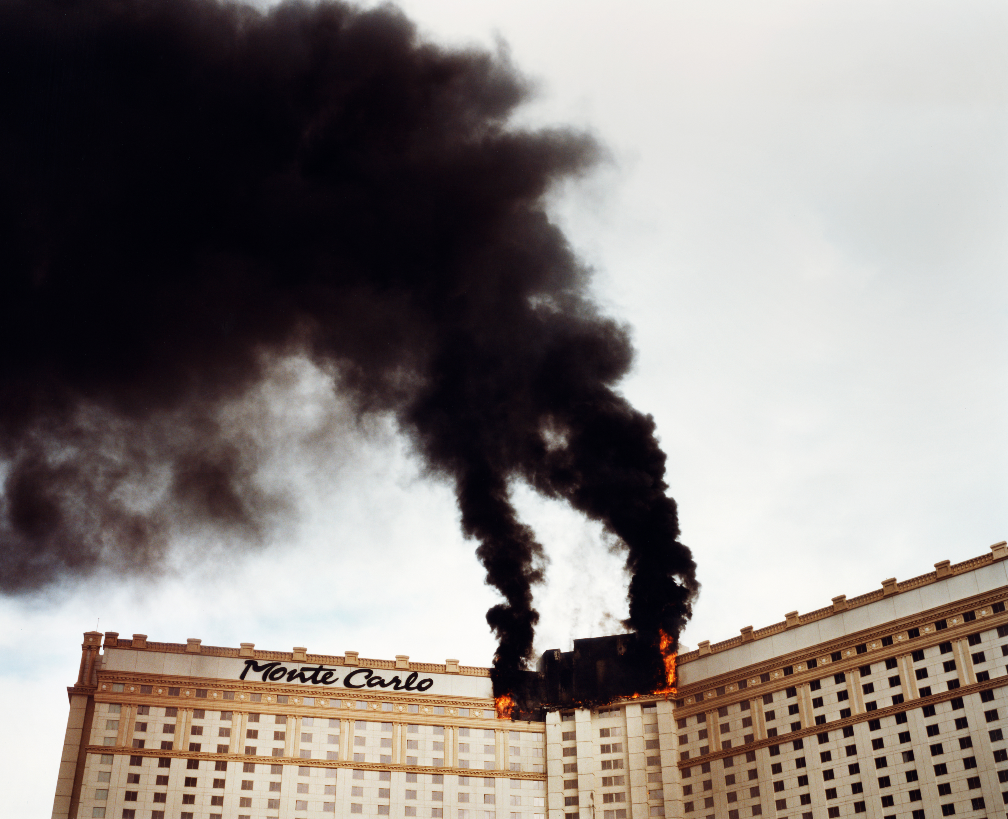 photography of a casino on fire