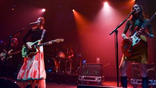 Jenny Lee Lindberg, Emily Kokal and Theresa Wayman of Warpaint perform at The Roundhouse on May 18, 2022 in London, England.