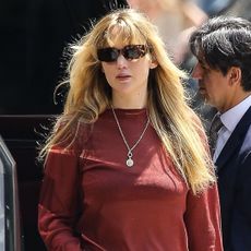 Jennifer Lawrence pulls off Mary Jane sneakers in NYC.