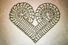 Two-dollar bills making a heart symbol