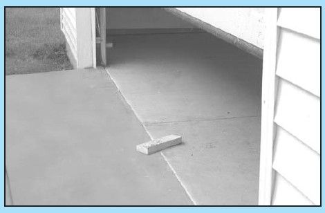 Screenshot image shows the Genie BeltLift garage door opener, which will stop a door in motion if it detects any object in its path.