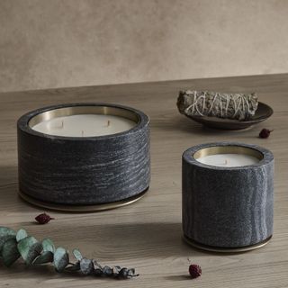 gray candles on a neutral background