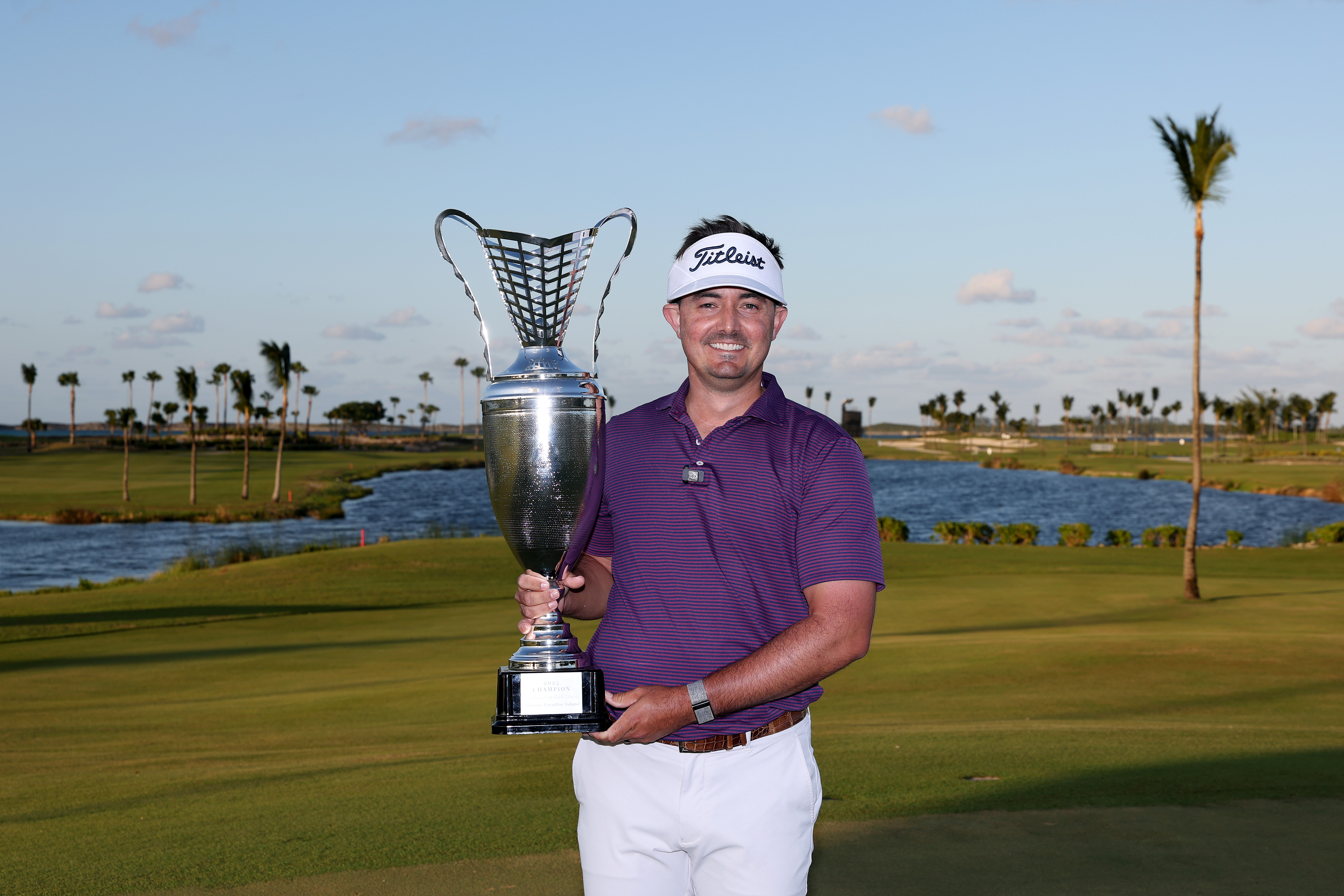 Hank Lebioda holds a trophy