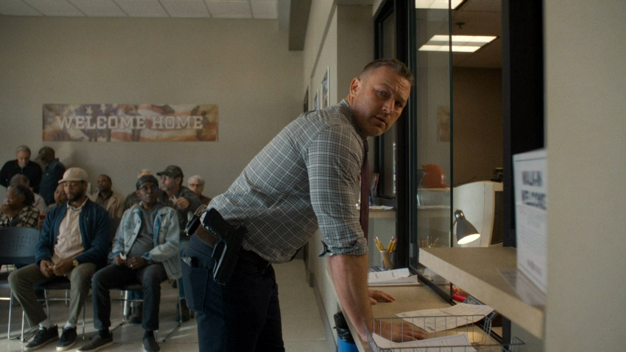 Jake McLaughlin looking towards camera in Will Trent.