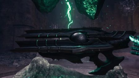 a gun that fires a metal ball attached to a chain for recall