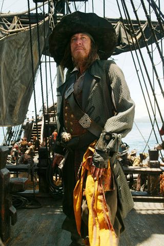 Geoffrey Rush as Captain Barbossa, no longer undead but still back from the dead.
