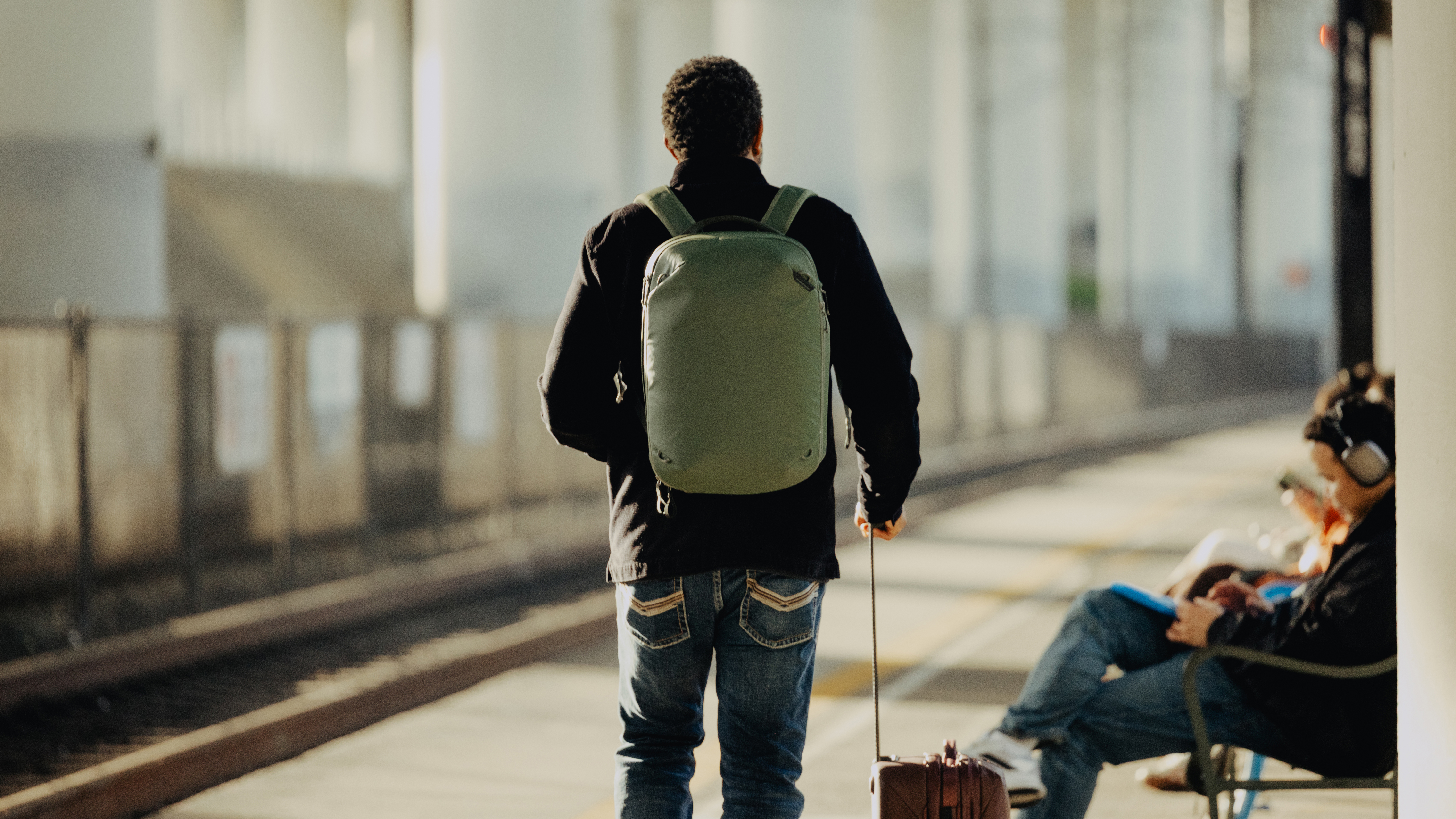 The Peak Design Travel Backpack 20L worn by a person