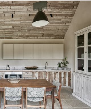 Kitchen cabinets clad in distressed wood