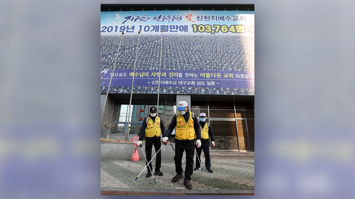 Officials disinfect a church in Daegu, South Korea, on Feb. 20.