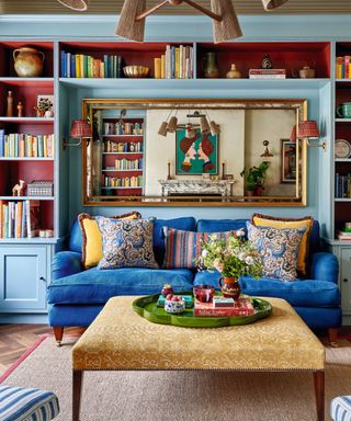 living room with blue sofa and bespoke inbuilt wall shelving