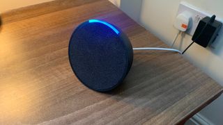 Amazon Echo Pop on a table 