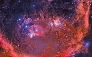 In this image, a mosaic of nine photographs, the Orion Nebula and the Horsehead Nebula are ringed by the emission nebula known as Barnard's Loop.