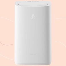 Meaco Cirro portable air conditioner cut out on a pink background