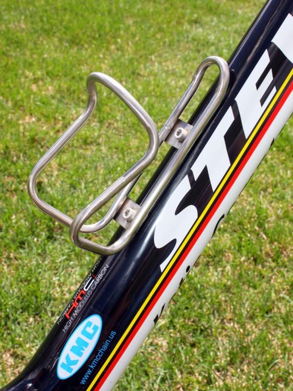 A bulletproof King Cage titanium bottle cage is bolted to the down tube.