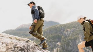 Arc'teryx MO/GO electric hiking pants on a user wearing them out in nature