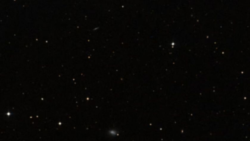 An image of stars in deep space as white dots against a black background