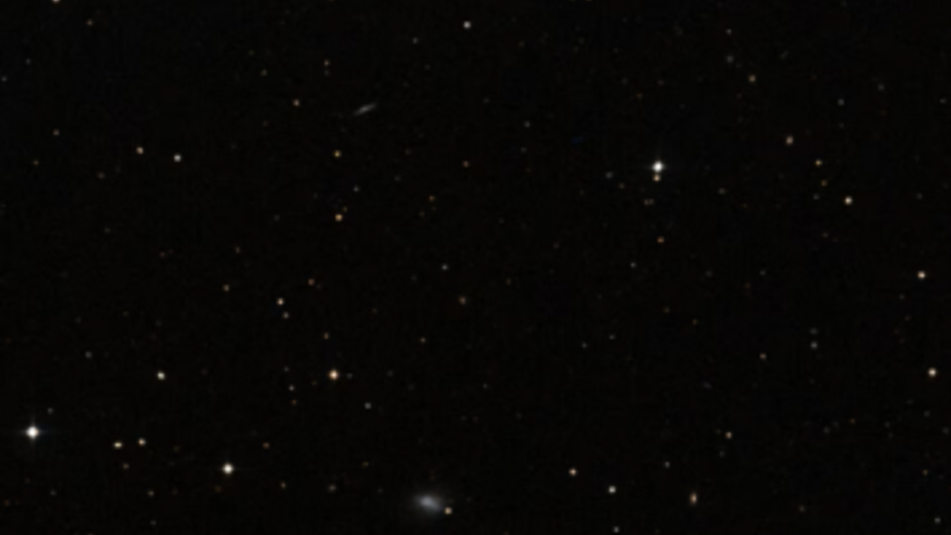 An image of stars in deep space as white dots against a black background