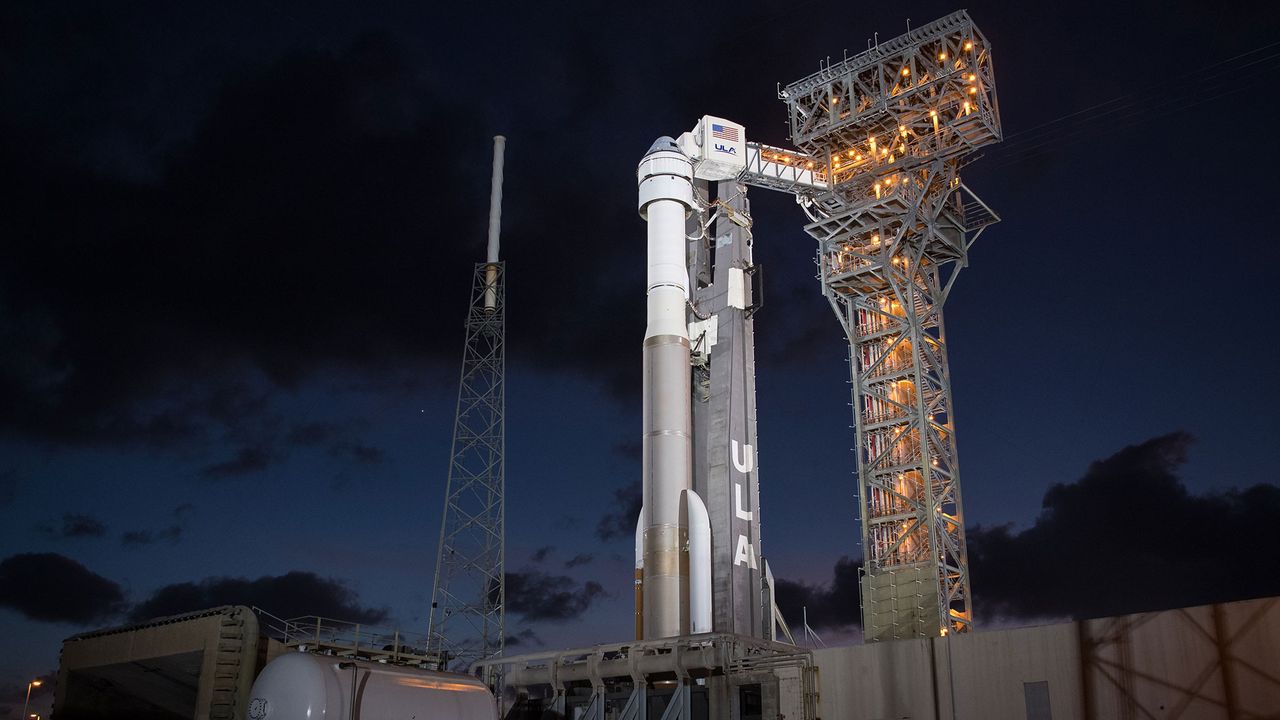 A United Launch Alliance Atlas V rocket with Boeing&rsquo;s CST-100 Starliner spacecraft onboard is seen illuminated by spotlights on the launch pad at Space Launch Complex 41 ahead of the Orbital Flight Test mission, Wednesday, Dec. 18, 2019 at Cape Canaveral Air Force Station in Florida.