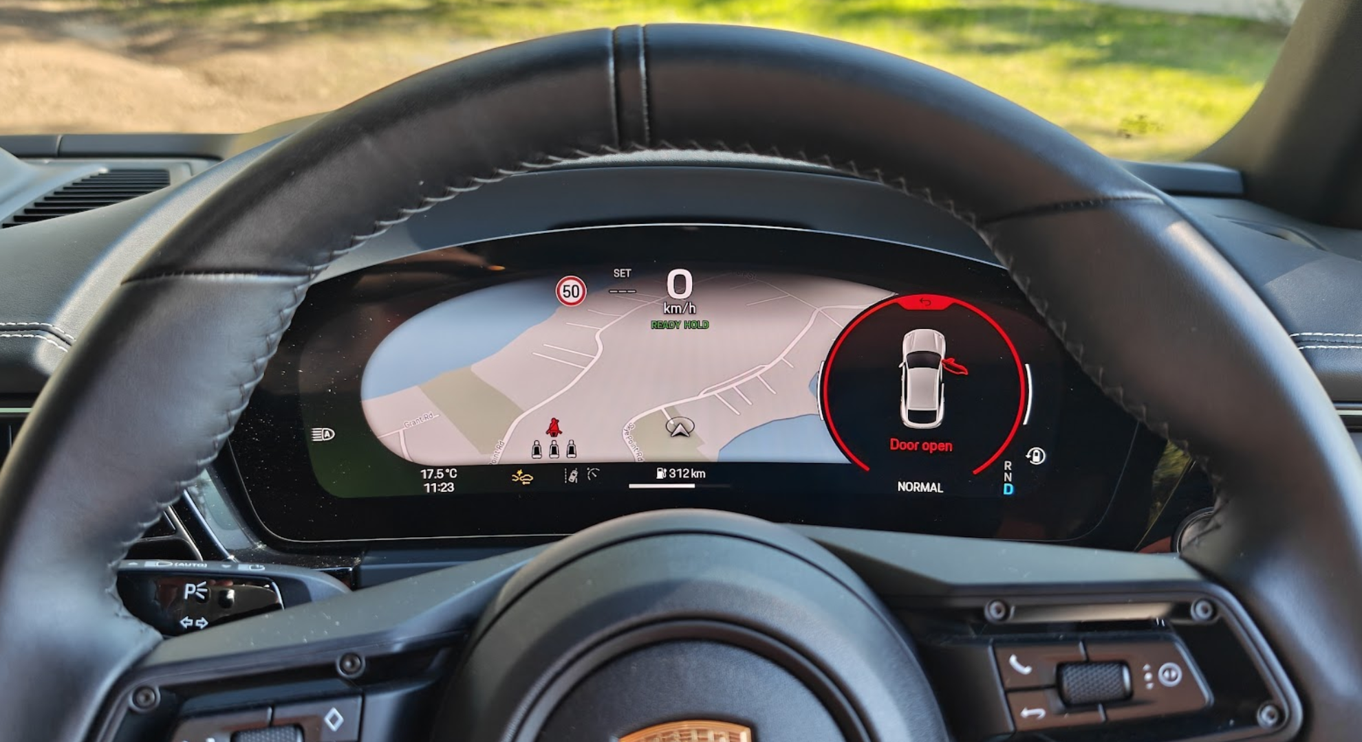 The instrument cluster in the Porsche Macan EV