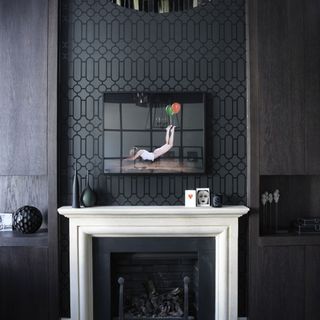 fireplace with art and frame