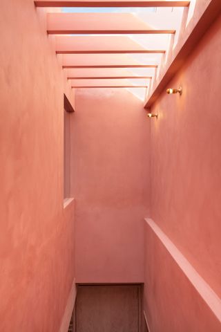 pink upper level of the Leyton house by McMahon architecture