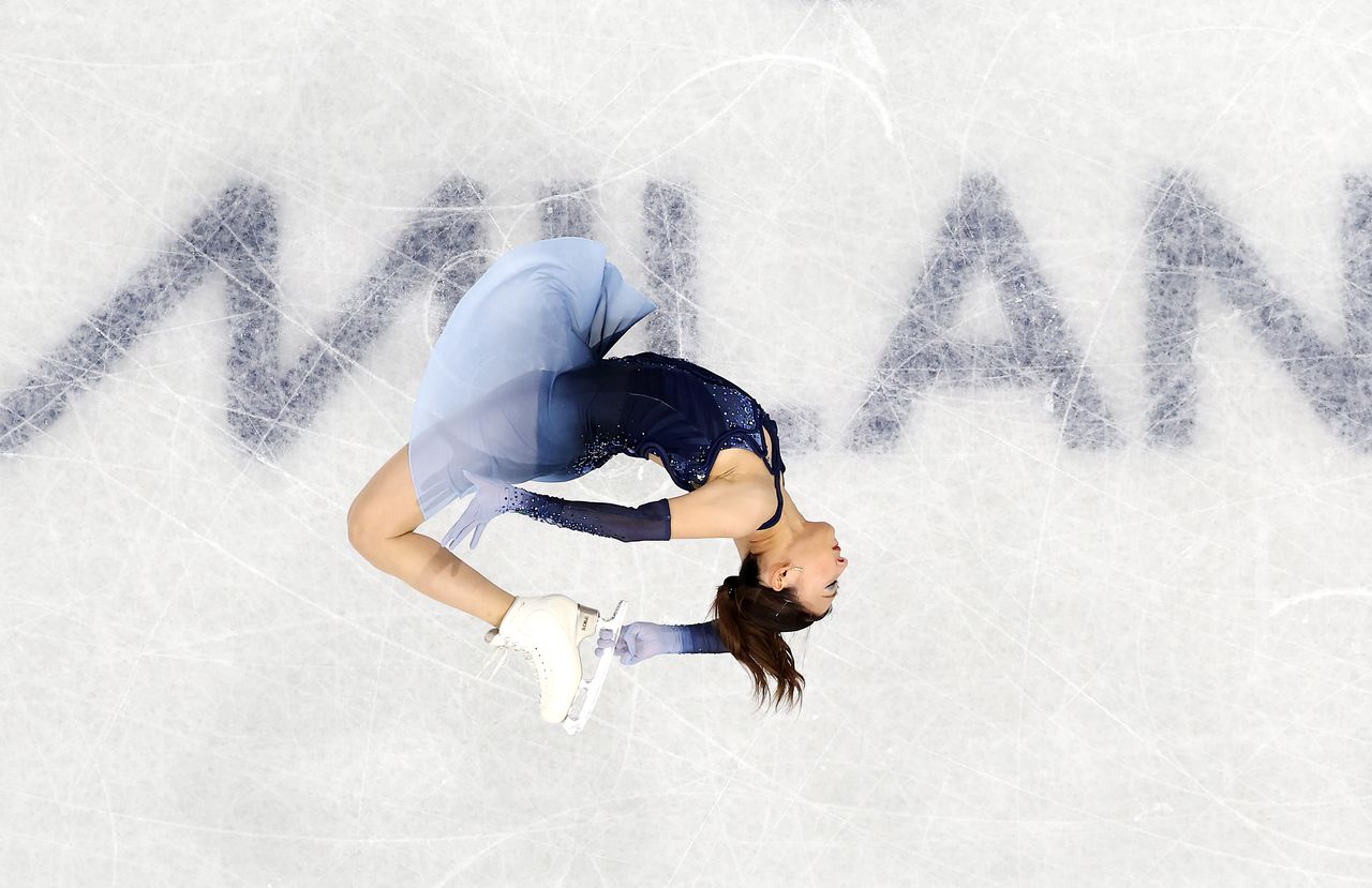 MILAN, ITALY - FEBRUARY 17: (EDITORS NOTE: Image was captured using a robotic camera positioned above the field of play.) Kaori Sakamoto of Team Japan competes during the Women&amp;apos;s Single Skating - Short Program on day eleven of the Milano Cortina 2026 Winter Olympic games at Milano Ice Skating Arena on February 17, 2026 in Milan, Italy. (Photo by Jared C. Tilton/Getty Images)