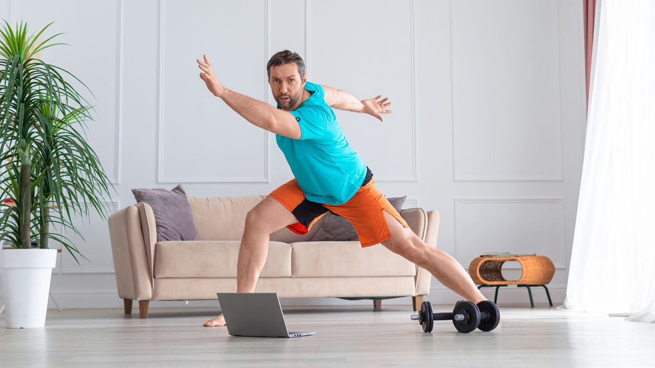 Man doing a HIIT workout at home