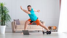 Man doing a HIIT workout at home