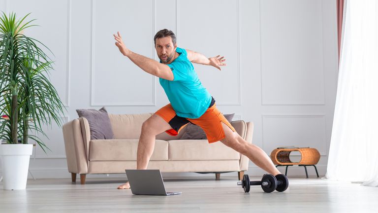Man doing a HIIT workout at home