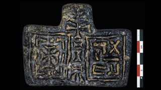 One of the striking finds from the early Christian church at Beta Samati is this pendant, decorated with a cross and a motto reading "venerable" in Ethiopia's ancient Ge'ez script.