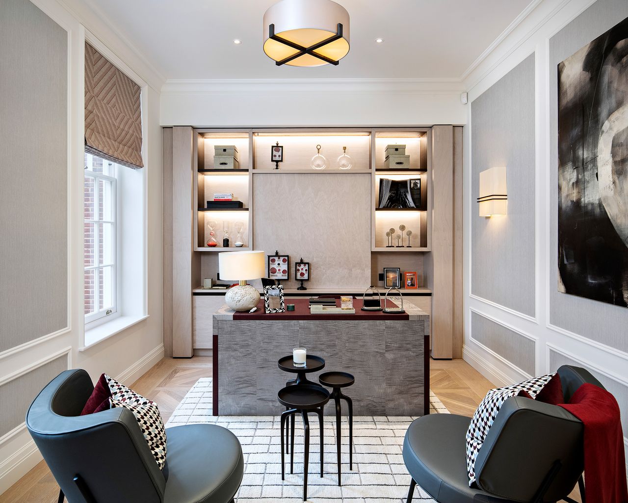 An example of how to turn a room into a walk-in closet showing a large dressing room with a central island, chairs and wall shelving